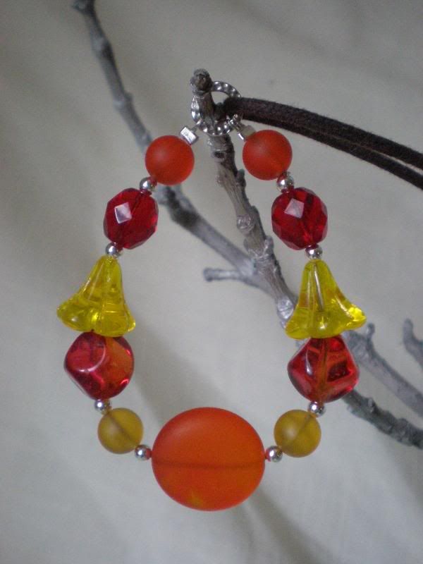 Red, orange, and yellow glass beaded nursing necklace