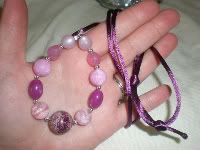 Purple stone, glass, and vintage lucite beaded nursing on neckace on purple satin cord