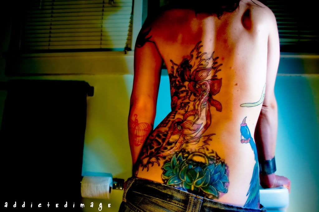 Lower back flower tattoo Tattooed Sexy woman