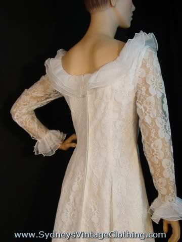 princess cut wedding dress White floral lace overlay The long sleeves